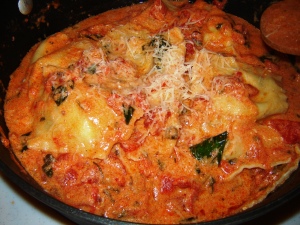 Homemade Lobster Ravioli with parsley, shallots, and fresh ricotta in a tomato cream sauce from Paggi Pazzo