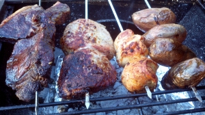 Brazilian style churrasco over a wood charcoal fire with steak, pork, chicken and potatoes from Paggi Pazzo!
