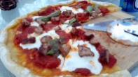 Grilled margherita pizza with sausage